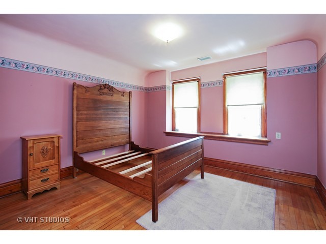 721 North Spring Street Elgin, IL 60120 - Photo 12 of 16 a living room with furniture and a window