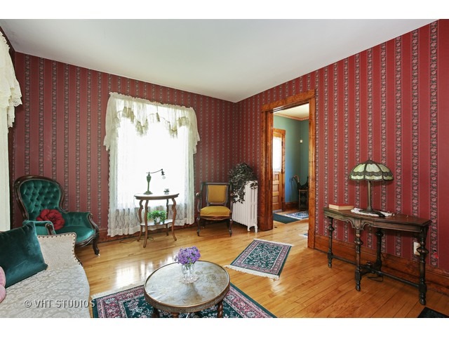 721 North Spring Street Elgin, IL 60120 - Photo 3 of 16 a living room with furniture and a large window