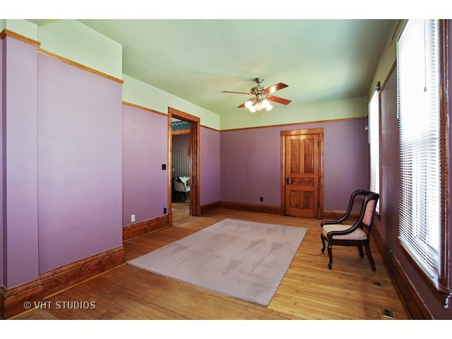 721 North Spring Street Elgin, IL 60120 - Photo 8 of 16 a very nice looking room with a window