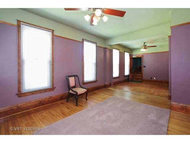 721 North Spring Street Elgin, IL 60120 - Photo 9 of 16 a view of an empty room with a window