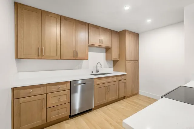 a kitchen with a stove and a microwave
