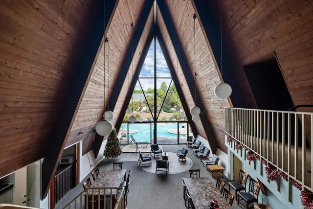 a room with furniture and a large window