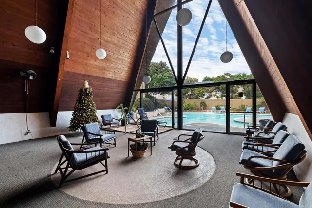 a room with furniture and a flat screen tv