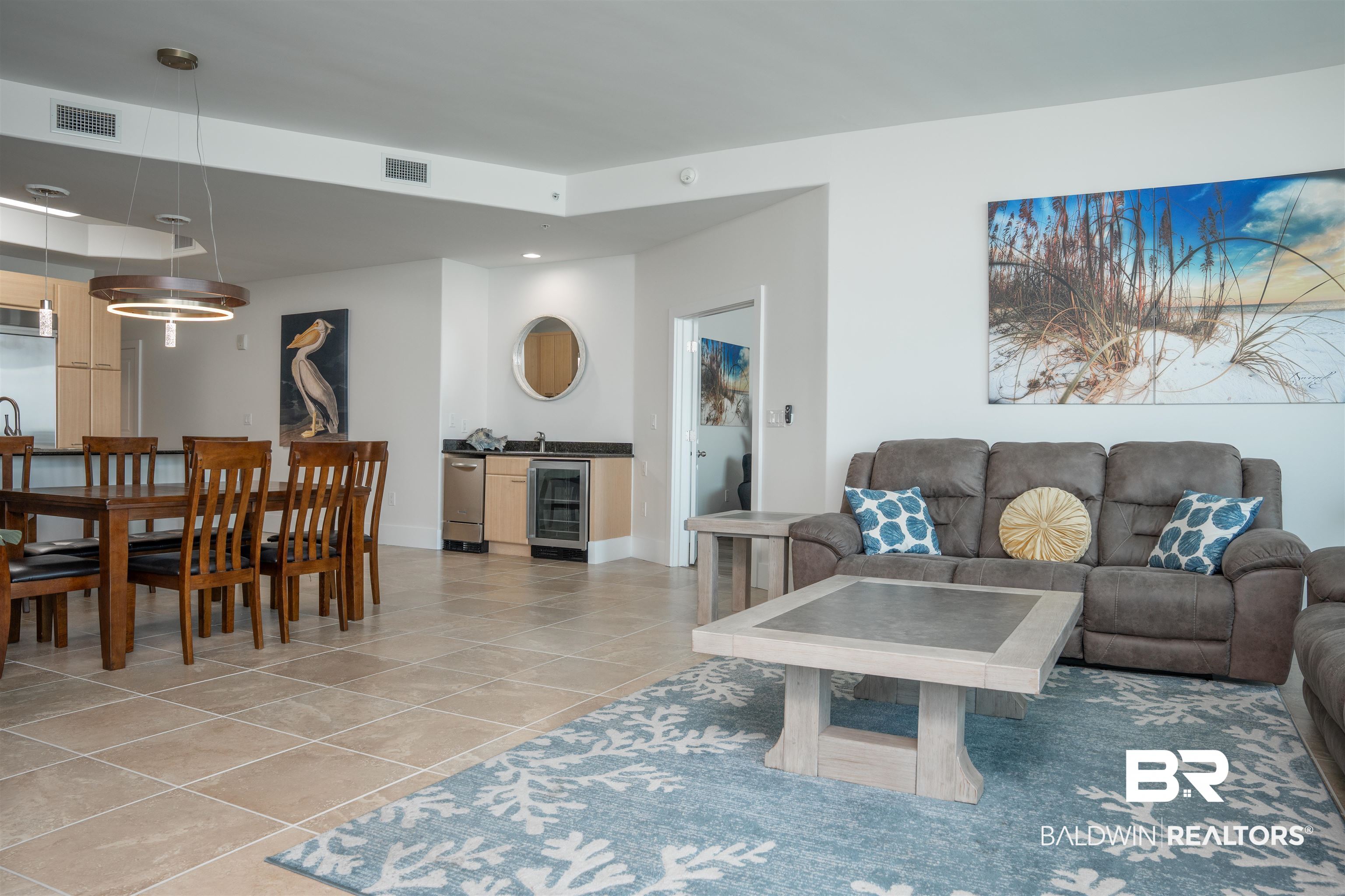28107 Perdido Beach Boulevard, Unit DPH05 Orange Beach, AL 36561 - Photo 5 of 43 Living room featuring beverage cooler, recessed lighting, and light tile patterned floors