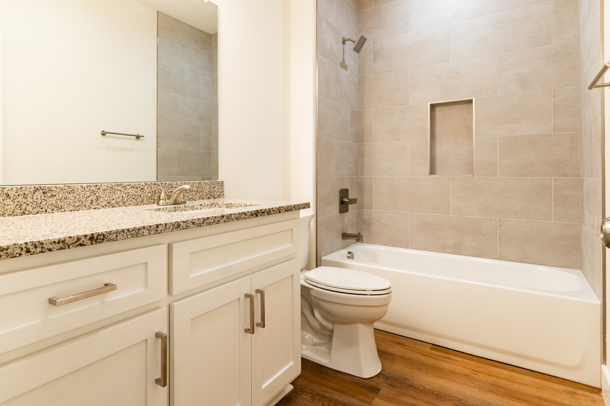 309 String Prairie Way Smithville, TX 78957 - Photo 27 of 30 a bathroom with a sink and a bathtub