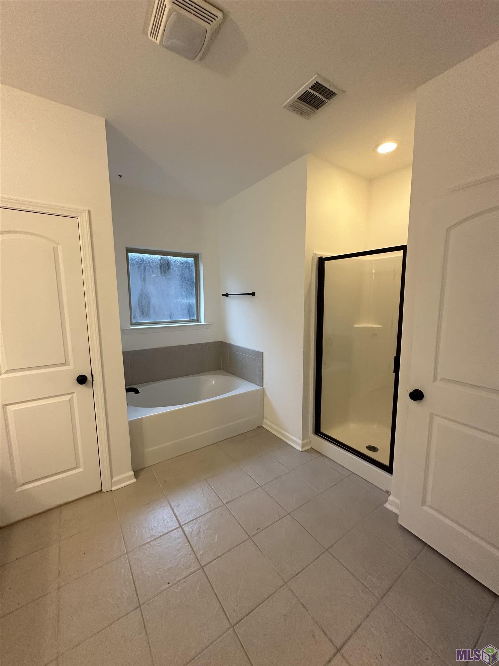 4414 Olivia Drive Addis, LA 70710 - Photo 12 of 16 Large Bathroom