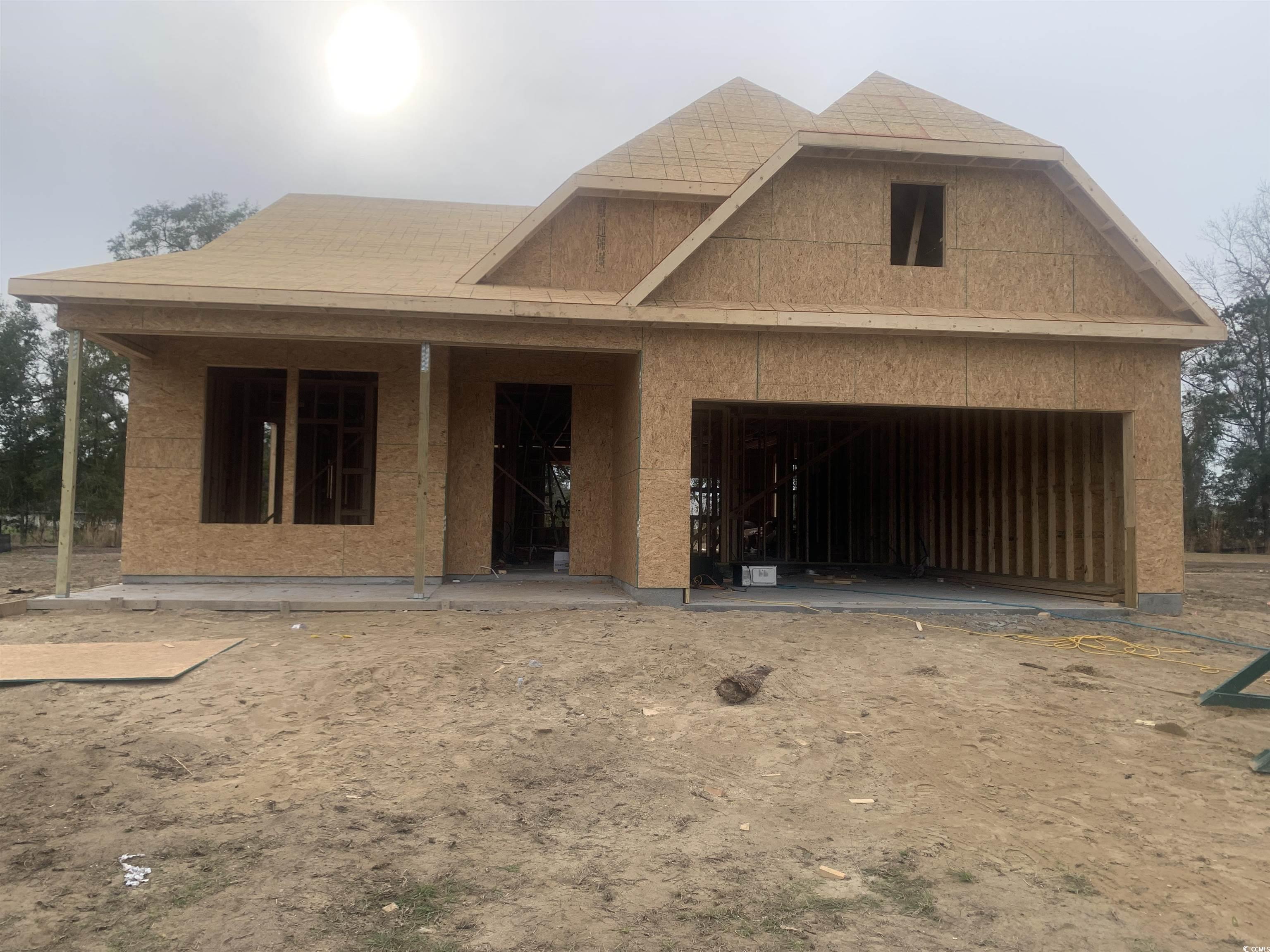 View of front facade with a garage