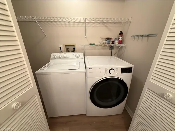 a utility room with dryer and washer