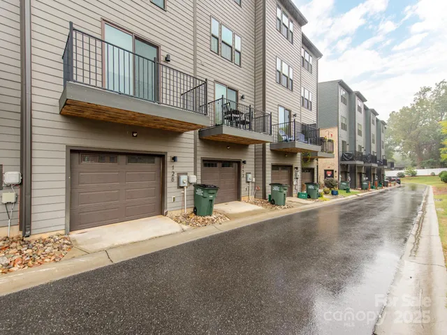 a front view of a building with a street