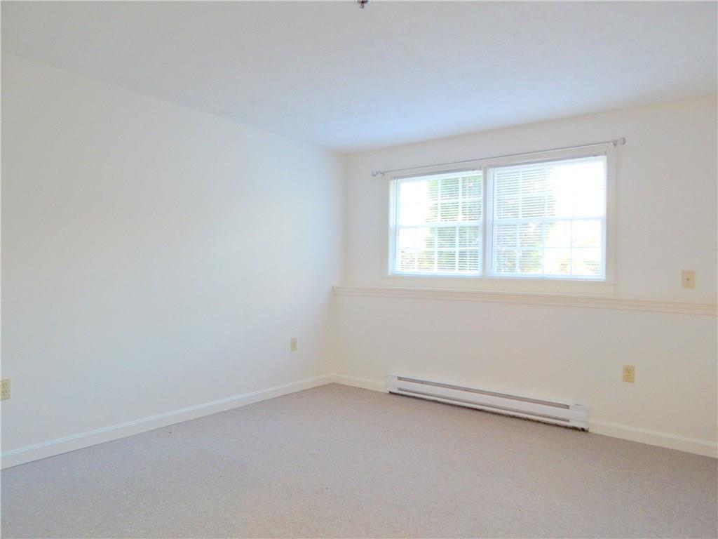 574 Main Street, Unit 102 Damariscotta, ME 04543 - Photo 13 of 27 Large bedroom and closet.