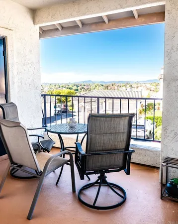 a view of a chairs in balcony