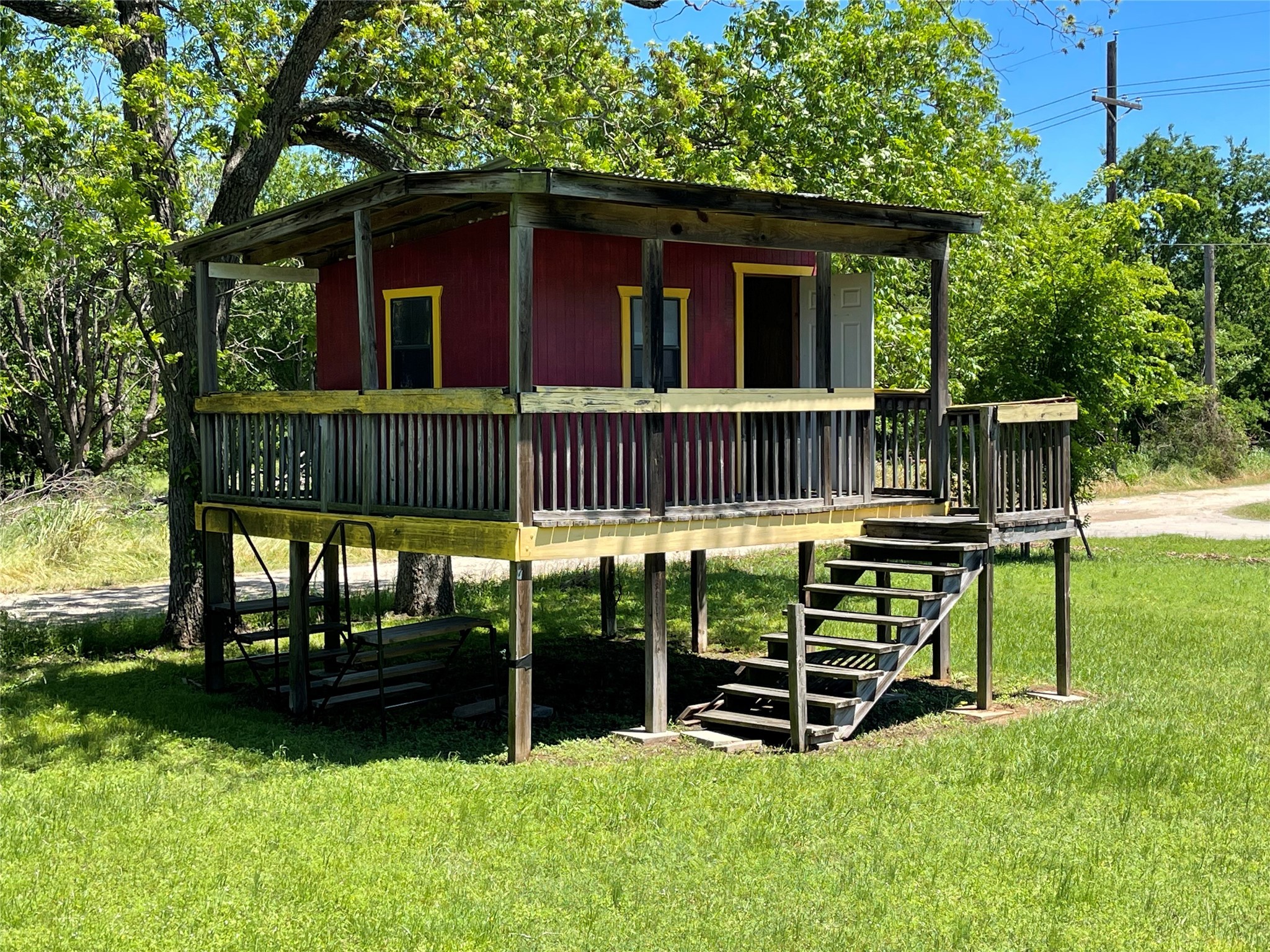322 College Street Fairfield, TX 75840 - Photo 34 of 34 a view of a chair and table in backyard of the house