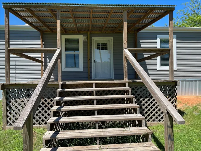 a view of entryway with a front door