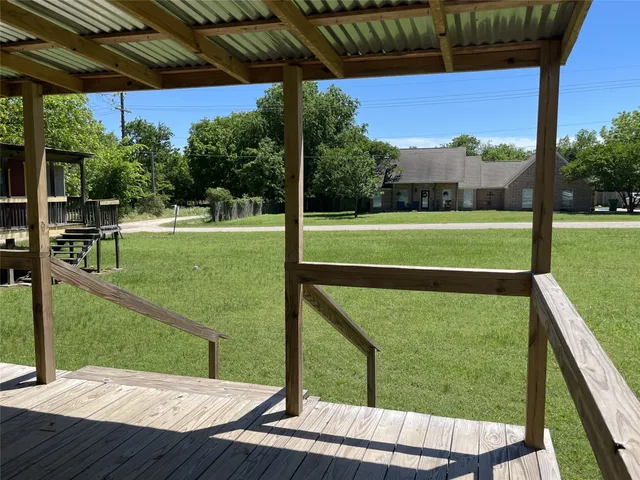 a view of back yard from deck