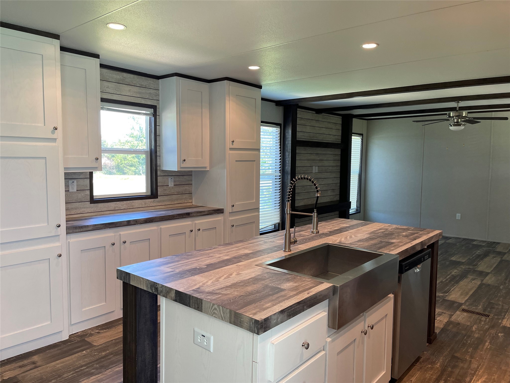 322 College Street Fairfield, TX 75840 - Photo 8 of 34 a kitchen that has a sink a window and stainless steel appliances