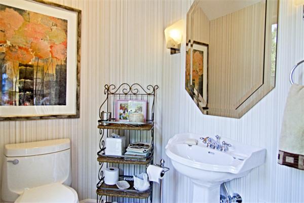 71 Donna Road Newton, MA 02459 - Photo 8 of 17 a bathroom with a toilet sink and mirror