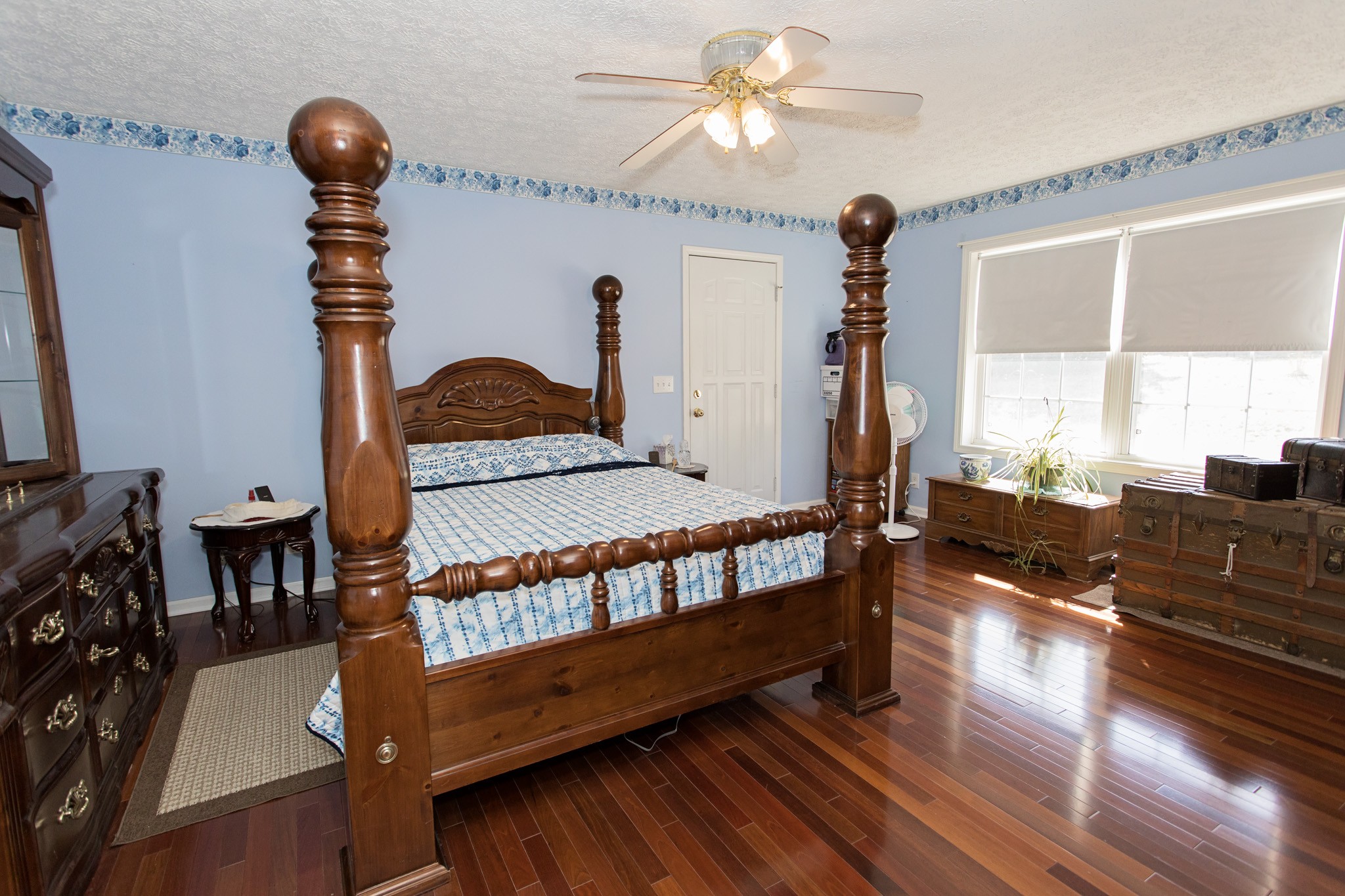 3579 Kinneys Road Cedar Hill, TN 37032 - Photo 12 of 26 a bedroom with furniture and wooden floor