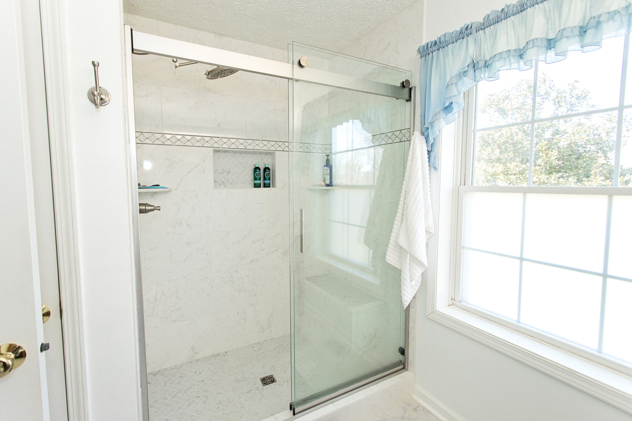3579 Kinneys Road Cedar Hill, TN 37032 - Photo 15 of 26 a bathroom with a glass shower door and a glass door shower