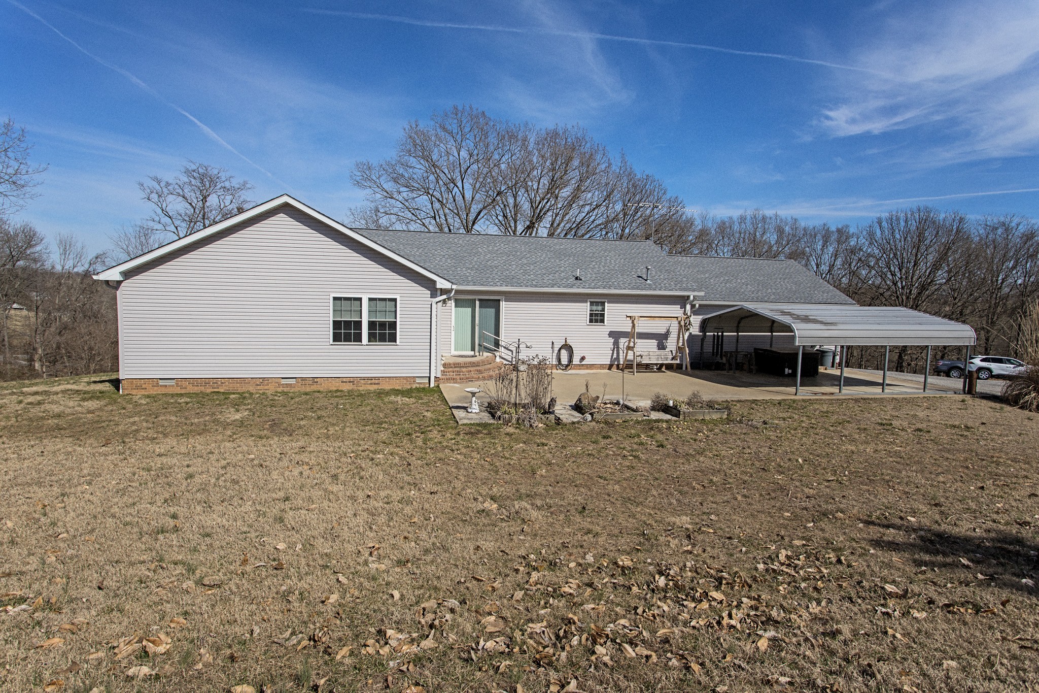 3579 Kinneys Road Cedar Hill, TN 37032 - Photo 18 of 26 a front view of a house with a yard