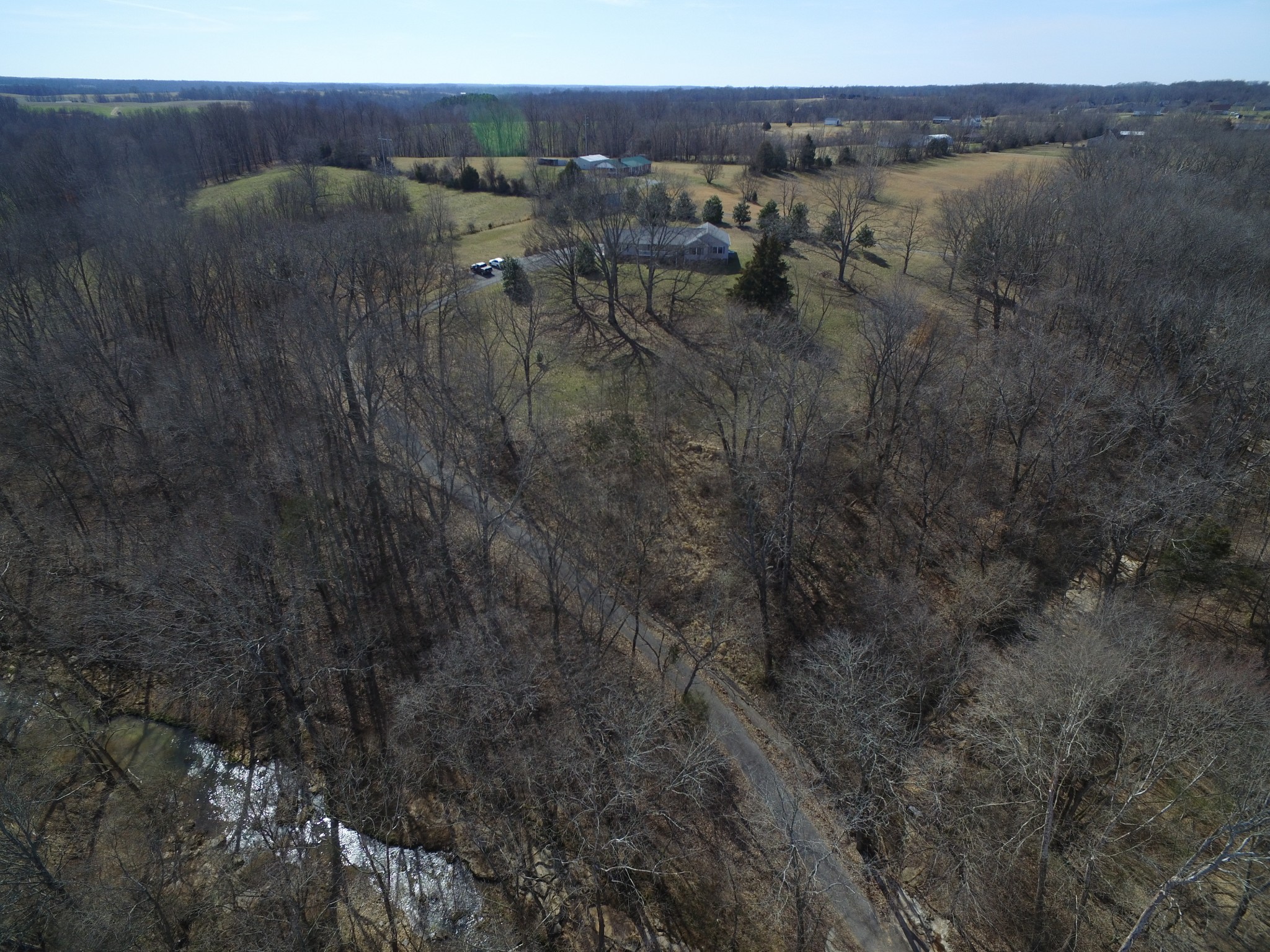 3579 Kinneys Road Cedar Hill, TN 37032 - Photo 21 of 26 a view of a lake with houses