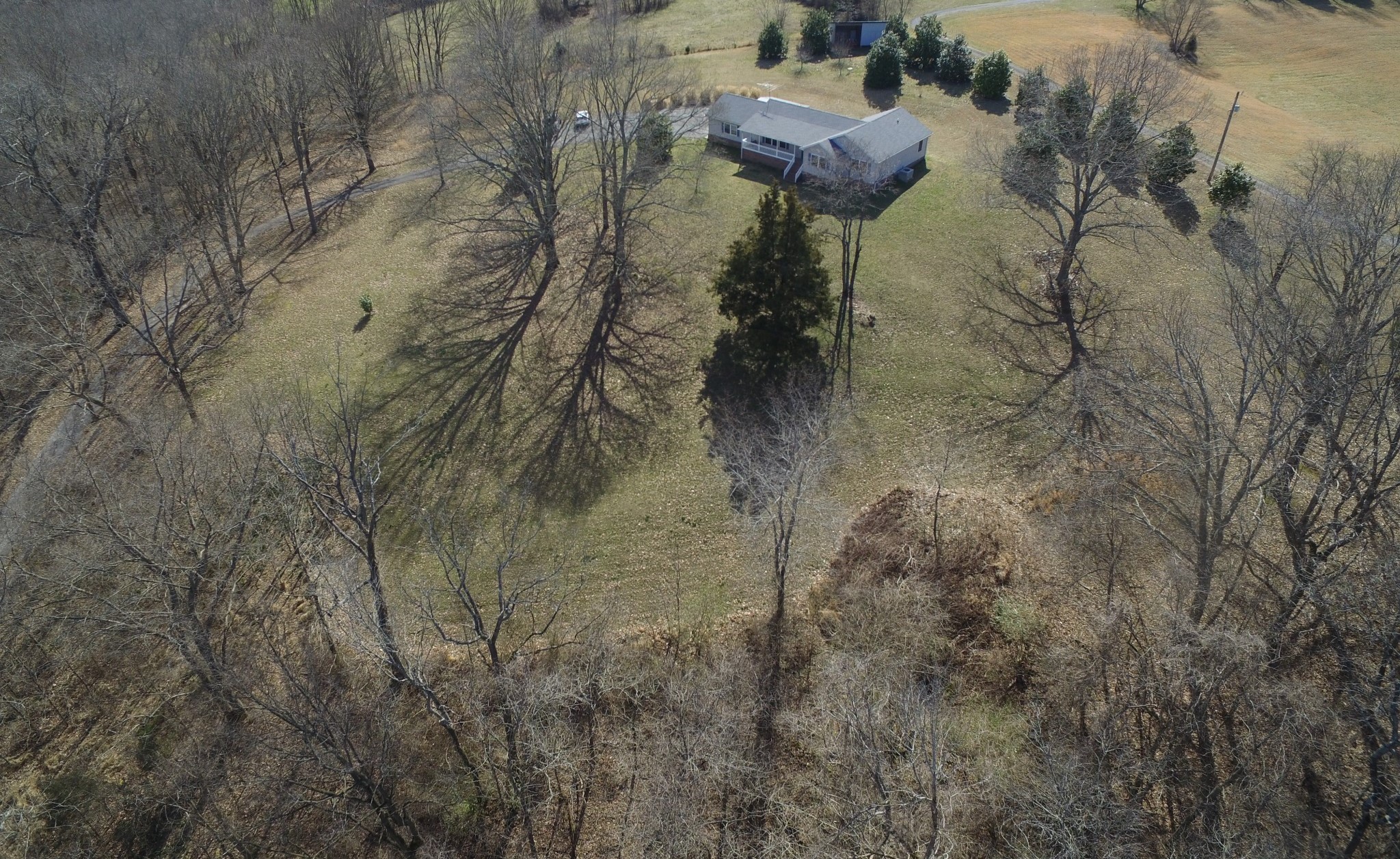3579 Kinneys Road Cedar Hill, TN 37032 - Photo 22 of 26 a view of a backyard of a house