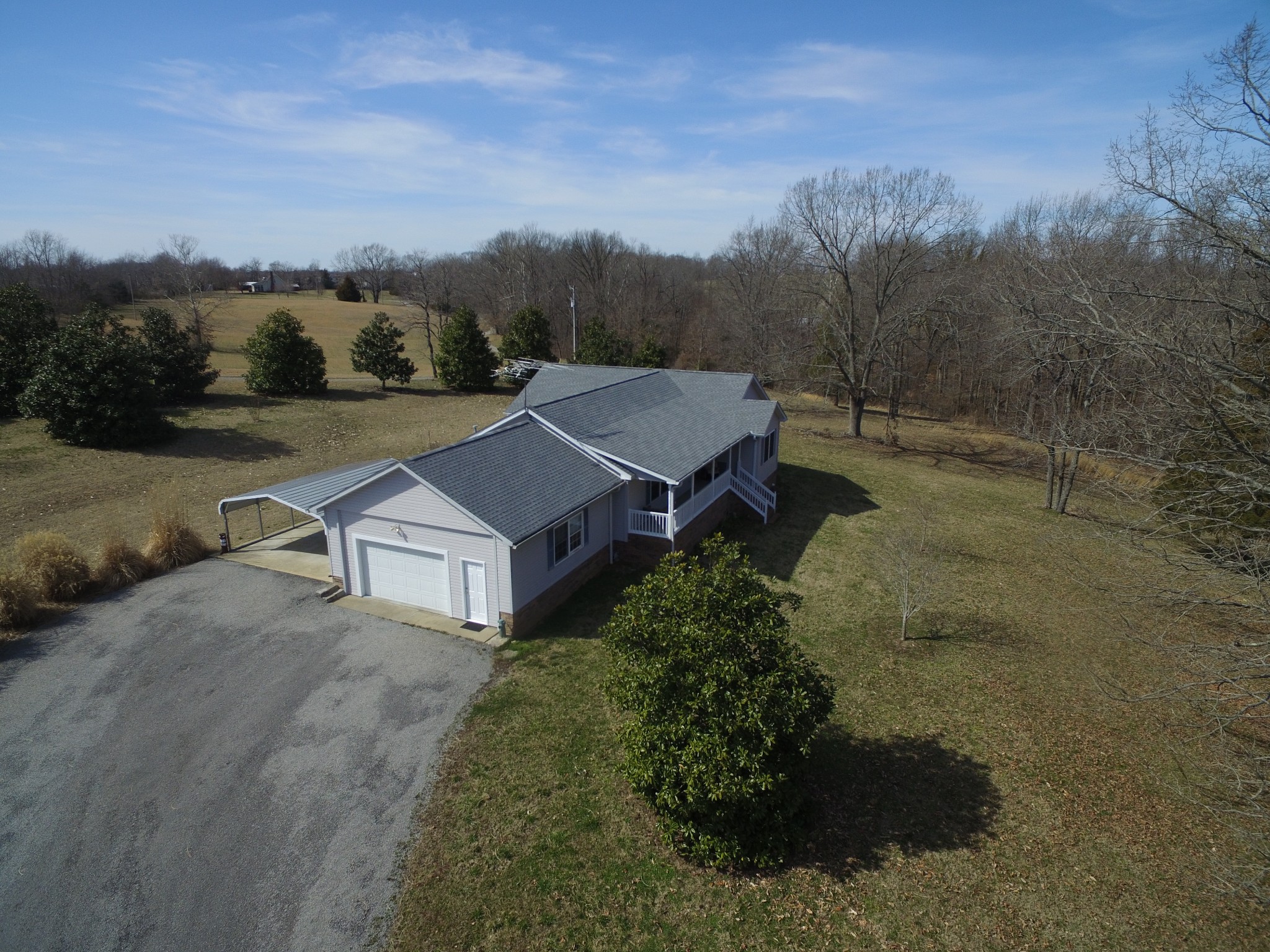 3579 Kinneys Road Cedar Hill, TN 37032 - Photo 24 of 26 a view of a house with a mountain yard