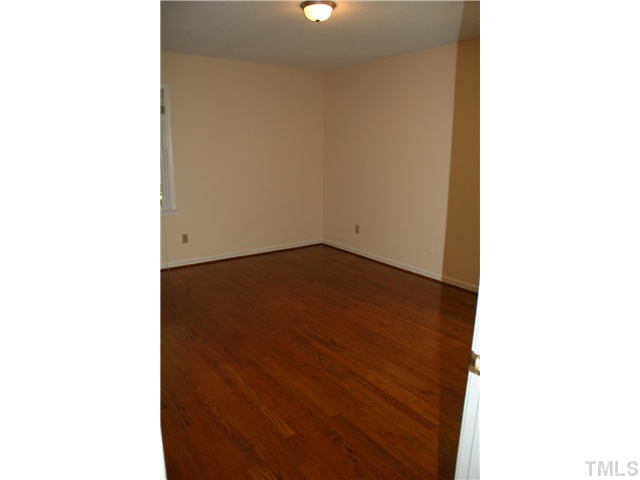 3221 Manor Ridge Drive Raleigh, NC 27603 - Photo 13 of 20 a picture of a room with a bench