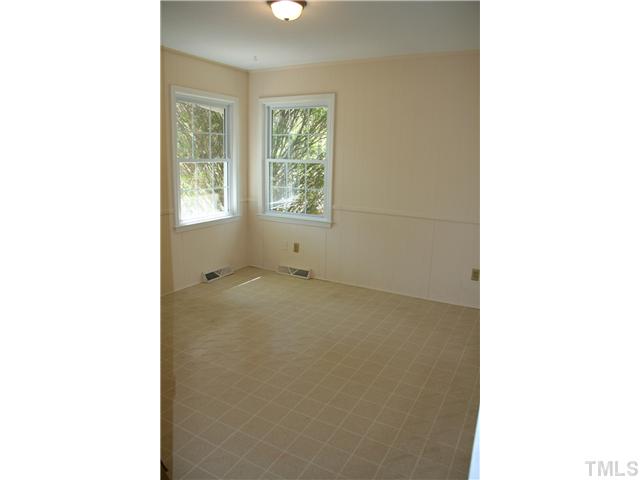 3221 Manor Ridge Drive Raleigh, NC 27603 - Photo 16 of 20 a picture of a room with a window