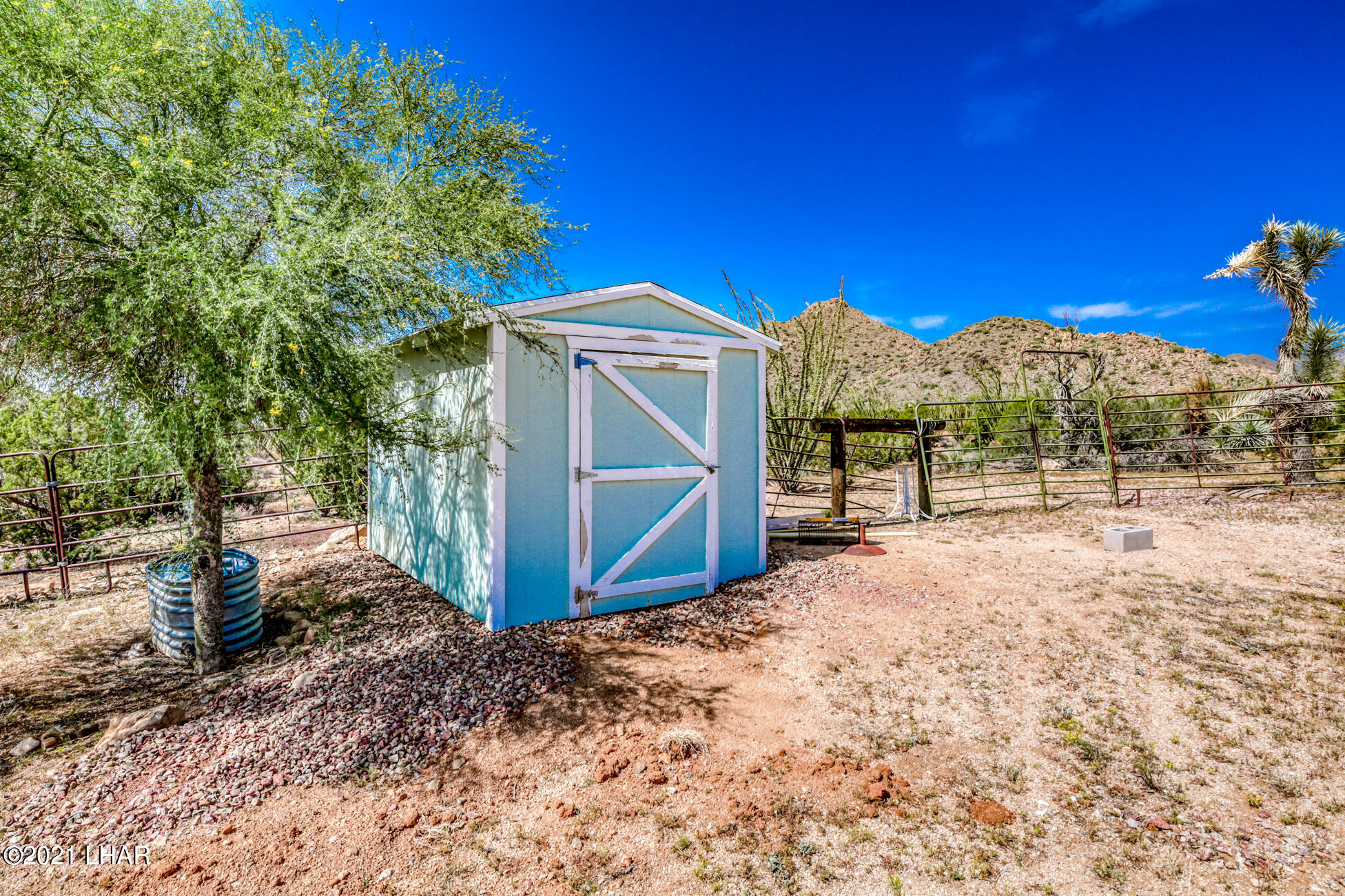 19622 South Cheyenne Road Yucca, AZ 86438 - Photo 41 of 65 Solar Shed and Buried Propane Tank