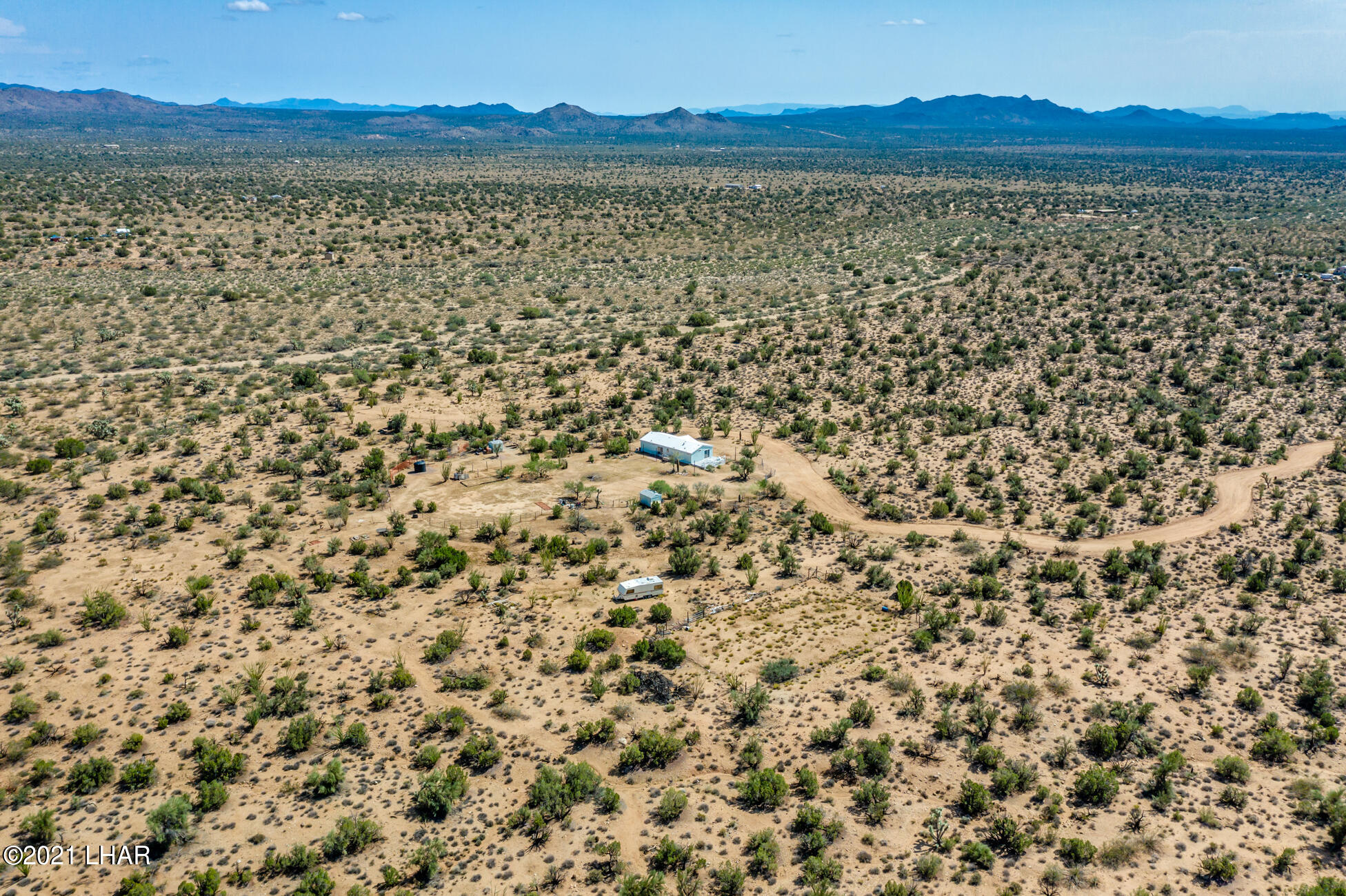 19622 South Cheyenne Road Yucca, AZ 86438 - Photo 62 of 65 19622CheyenneRdSDrone_18