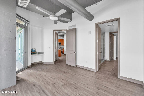 1 East Lexington Avenue, Unit 809 Phoenix, AZ 85012 - Photo 16 of 44 wooden floor in a hall with an entryway
