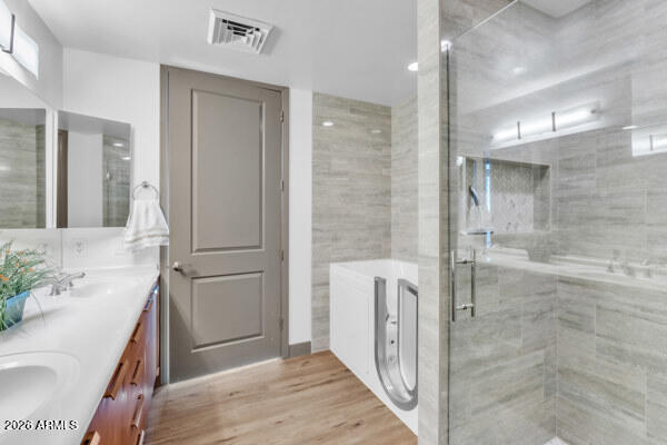 1 East Lexington Avenue, Unit 809 Phoenix, AZ 85012 - Photo 18 of 44 a bathroom with a sink and a mirror