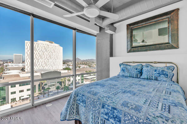 1 East Lexington Avenue, Unit 809 Phoenix, AZ 85012 - Photo 23 of 44 a bedroom with a large bed and a window