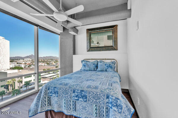 1 East Lexington Avenue, Unit 809 Phoenix, AZ 85012 - Photo 24 of 44 a bedroom with a bed and a window