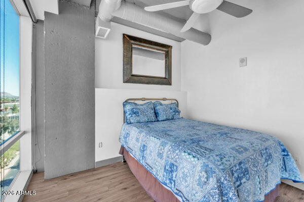 1 East Lexington Avenue, Unit 809 Phoenix, AZ 85012 - Photo 25 of 44 a bedroom with a bed and a window