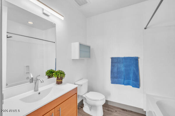 1 East Lexington Avenue, Unit 809 Phoenix, AZ 85012 - Photo 28 of 44 a bathroom with a sink toilet and shower