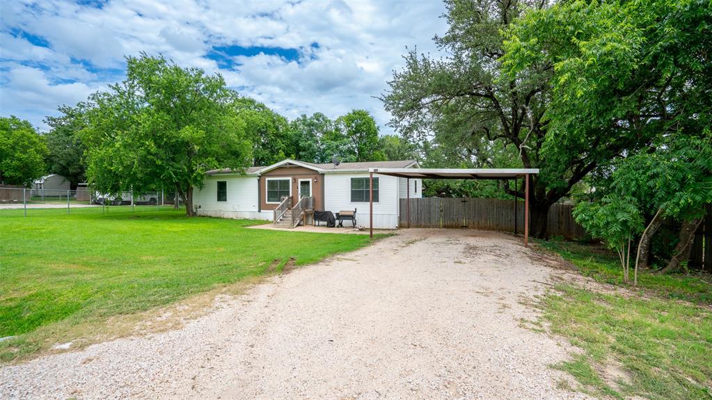 4501 Rhea Road Granbury, TX 76049 - Photo 22 of 29 Another view of front and 2 spot carport