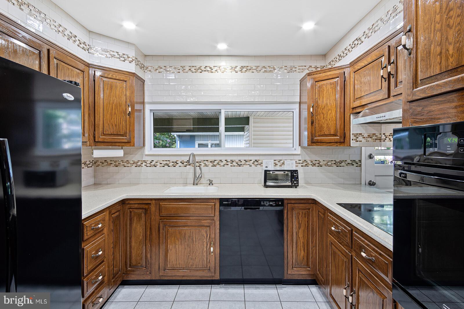 1513 Emory Road Wilmington, DE 19803 - Photo 6 of 30 Kitchen with access to the carport