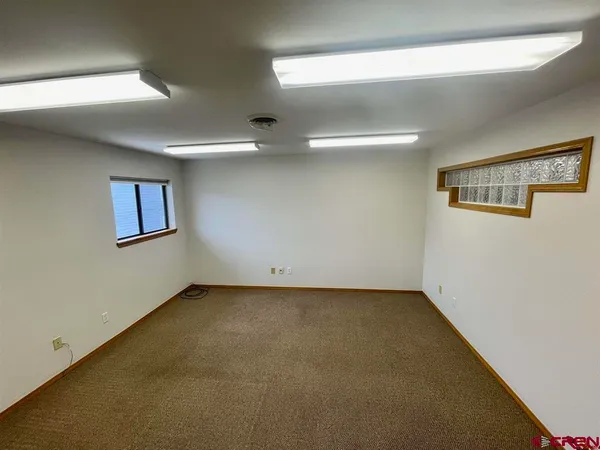 a view of a big room with window