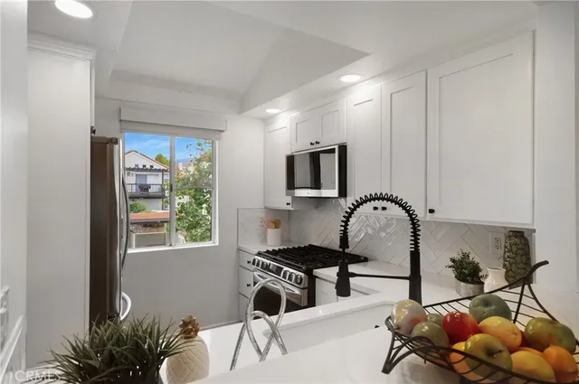 a room with furniture potted plant and a window