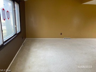 488 Catlin Road Cleveland, OH 44143 - Photo 6 of 23 Unfurnished room featuring light colored carpet
