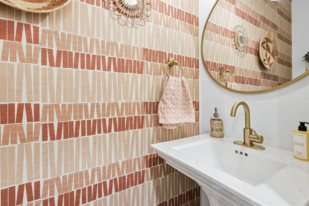 528 Ranchito Pass Fort Worth, TX 76052 - Photo 20 of 28 a bathroom with a sink and a mirror