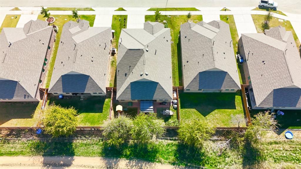 528 Ranchito Pass Fort Worth, TX 76052 - Photo 27 of 28 an aerial view of multiple houses with yard