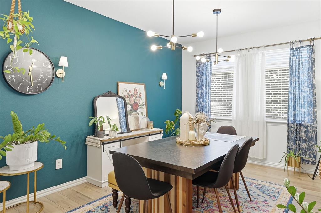 528 Ranchito Pass Fort Worth, TX 76052 - Photo 5 of 28 a view of a dining room with furniture window and wooden floor