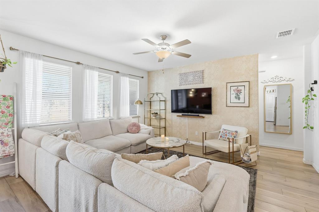 528 Ranchito Pass Fort Worth, TX 76052 - Photo 7 of 28 a living room with furniture and a flat screen tv