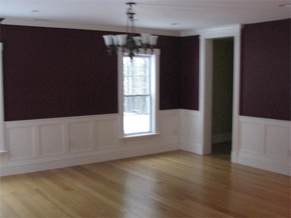 546 Fowler Road Northbridge, MA 01534 - Photo 4 of 11 an empty room with wooden floor and windows
