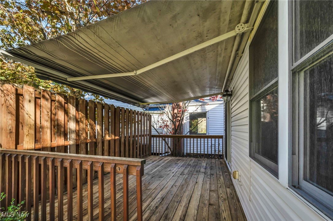 503 Churchill Road Youngstown, OH 44505 - Photo 17 of 32 View of wooden deck with awning