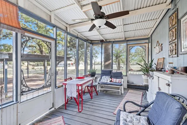 a work room with furniture and windows