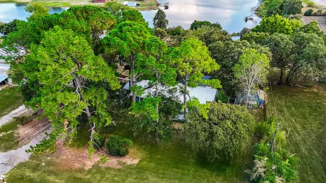a backyard of a house with lots of green space