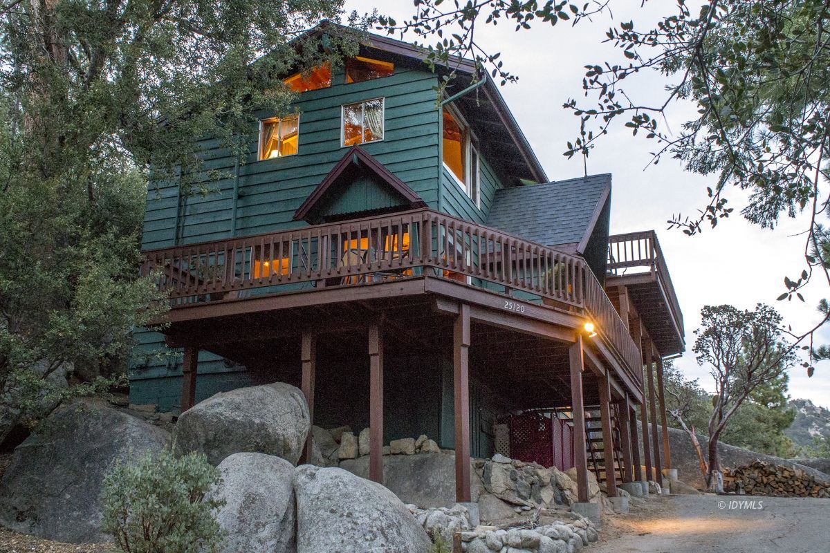 25120 Foster Lake Road Idyllwild, CA 92549 - Photo 1 of 31 a front view of a house with garden